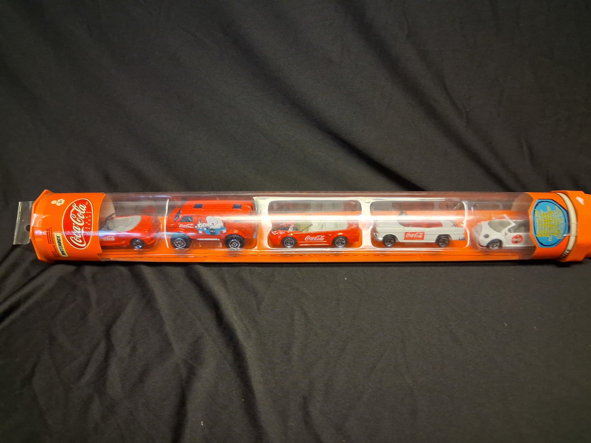 Matchbox Coca Cola collectors tube with die cast cars